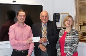 Change Group presenting cheque for Â£1180 for two Shelterboxes for Nepal Appeal